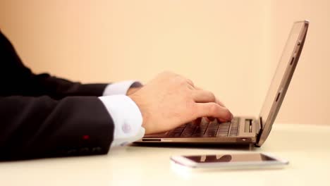 businessman using tablet and laptop 1