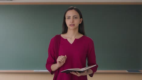 Indian female teacher solving student problem
