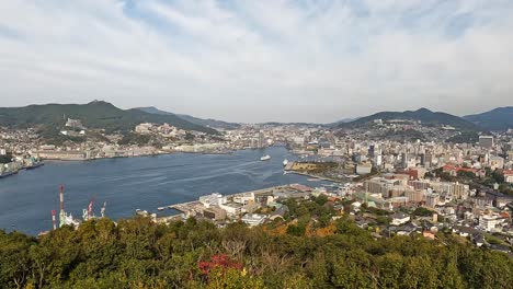 nagasaki, japan cityscape at megane spectacles bridge at dusk