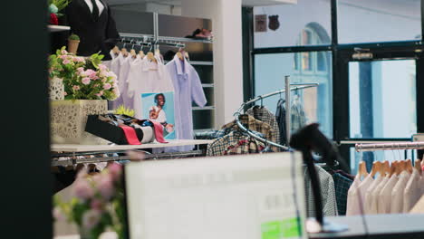 empty clothing store with trendy outfit