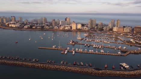 Aerial-view-approaching-marina-in-Punta-del-Este,-Uruguay