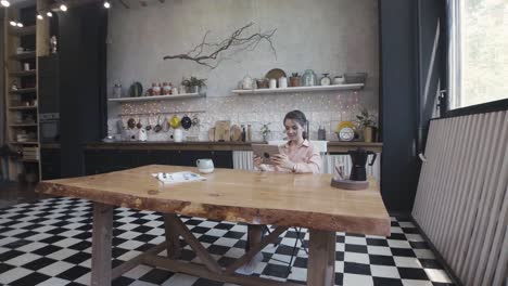 woman relaxing in a modern kitchen