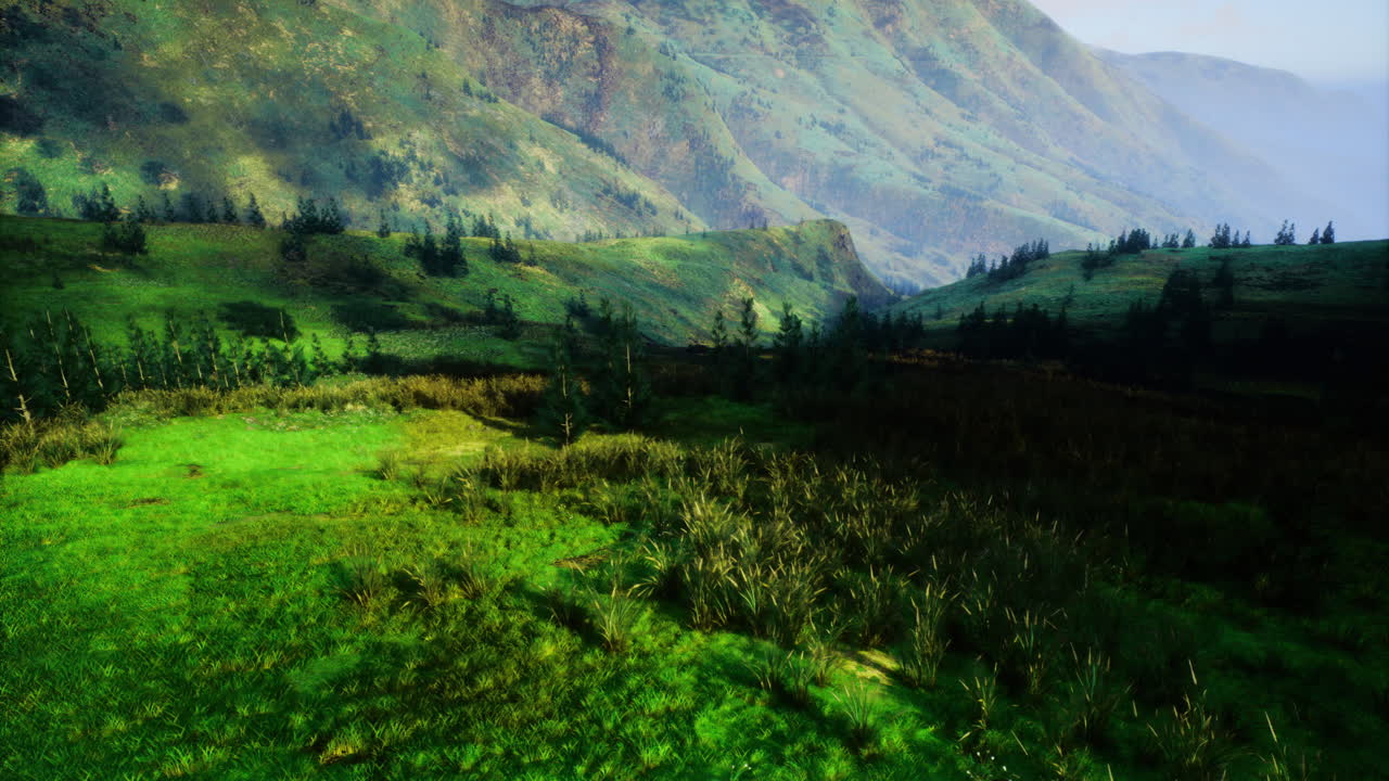 Mountain landscape with lush greenery and distant hills under bright sky