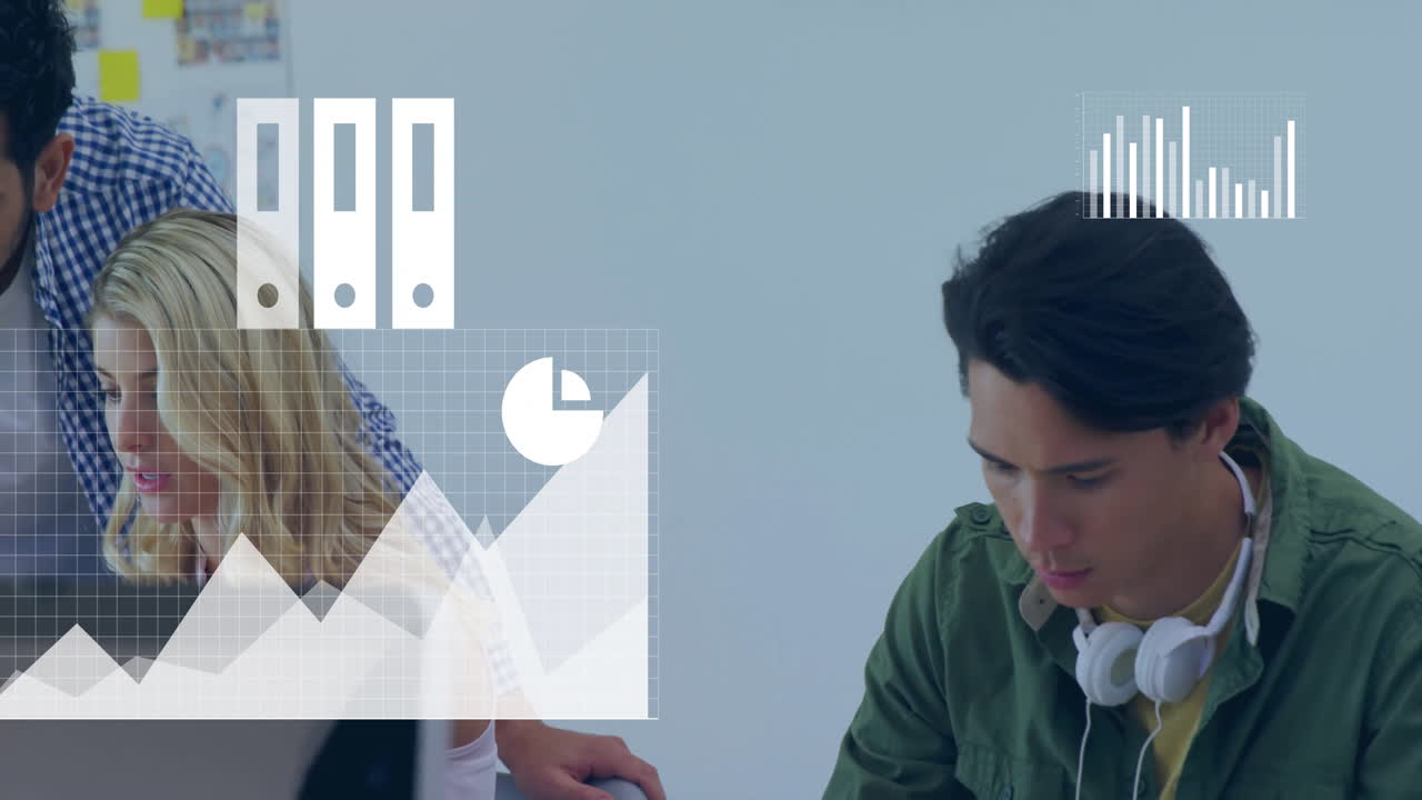 Office workers collaborating around laptops in tech meeting, showing floating charts and graphs