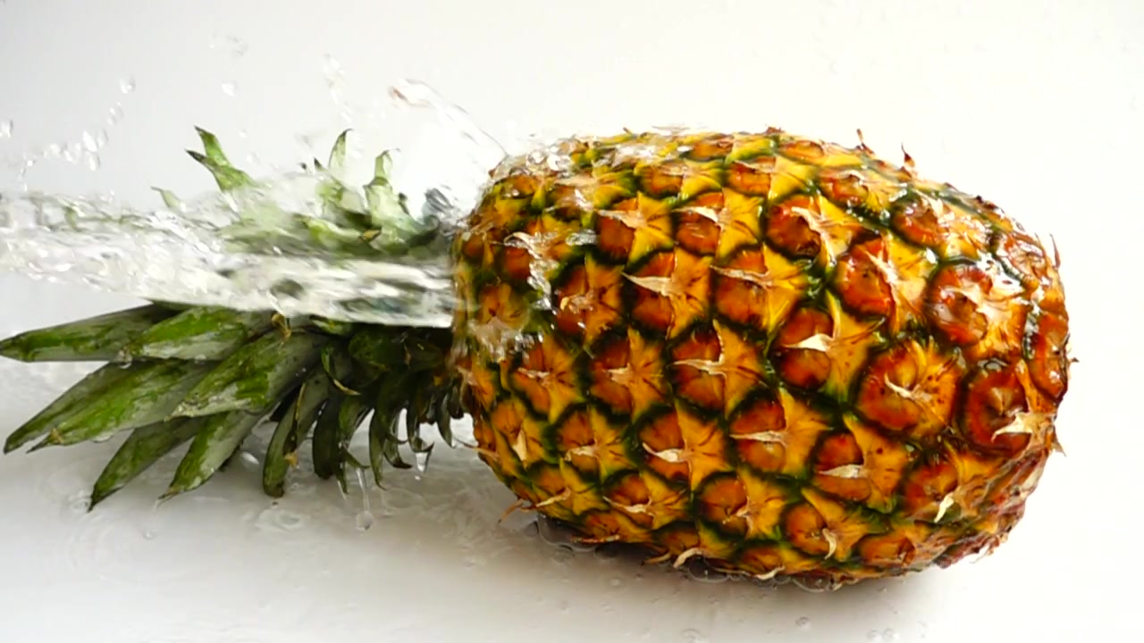 Fresh ripe pineapple. Slow motion.