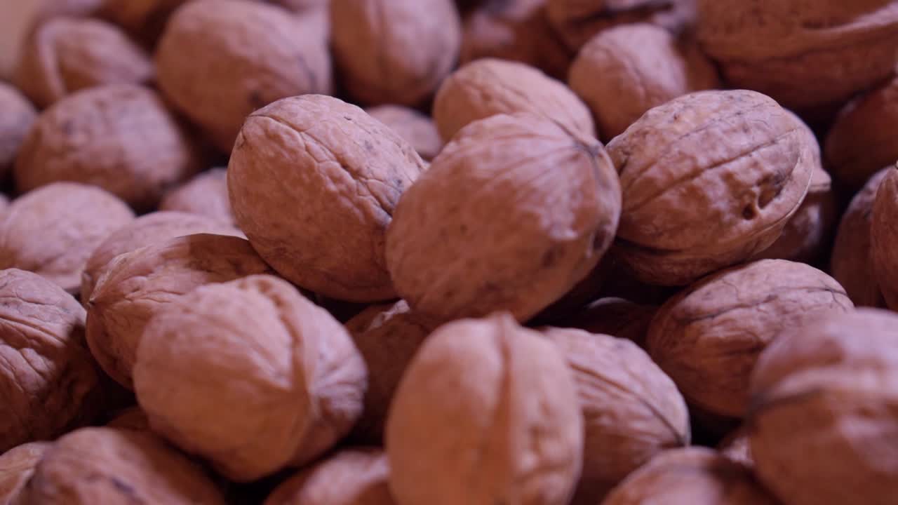 Dried walnuts in a wooden bowl-10