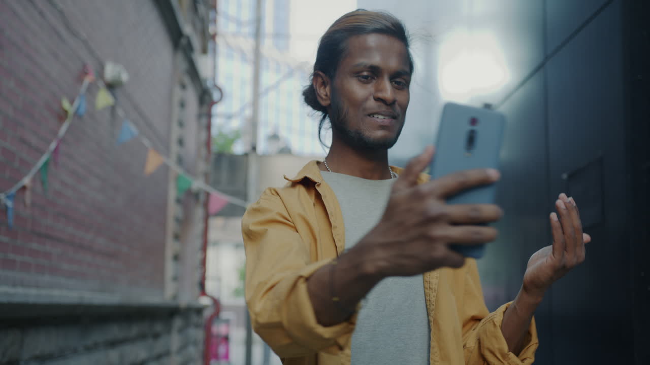 Young Man Taking Selfie in Urban Alley