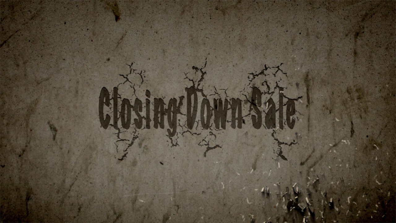 Closing down sale, a brick wall crumbling or text exploding from a wall