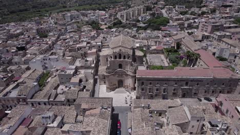 aerial orbit historic concave facade madonna del carmine, noto sicily