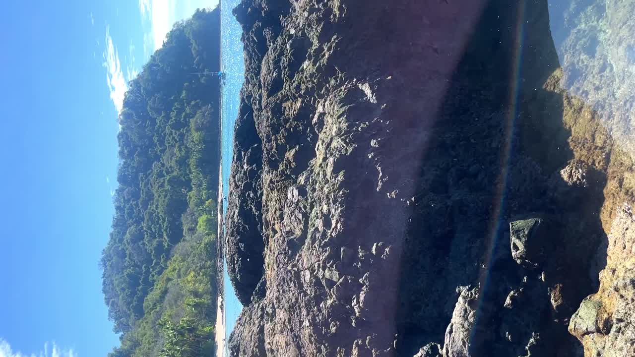 Small natural pool with crystal clear sea water in a beautiful sunny day