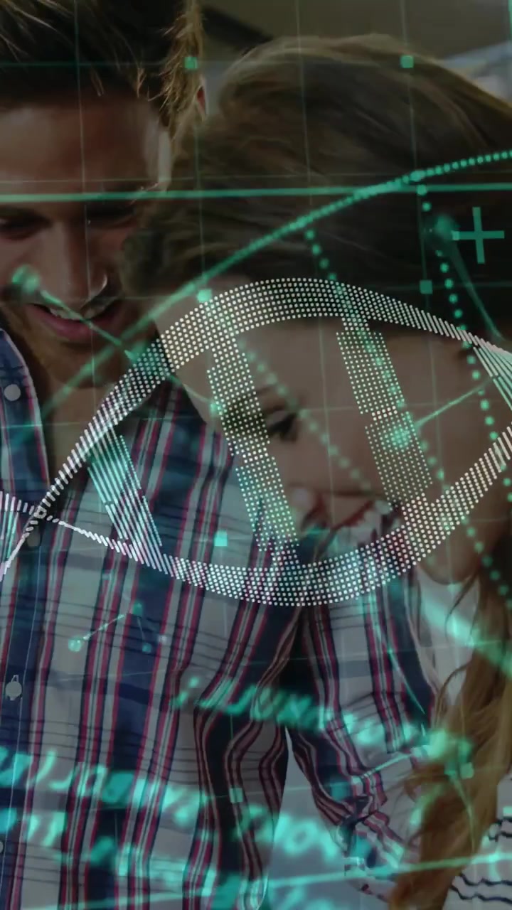 Vertical video: Two peers leaning over tablet while hand bringing device, AR helix showing lab data