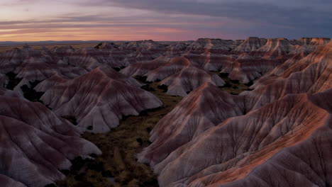 vast badlands landscape at sunset