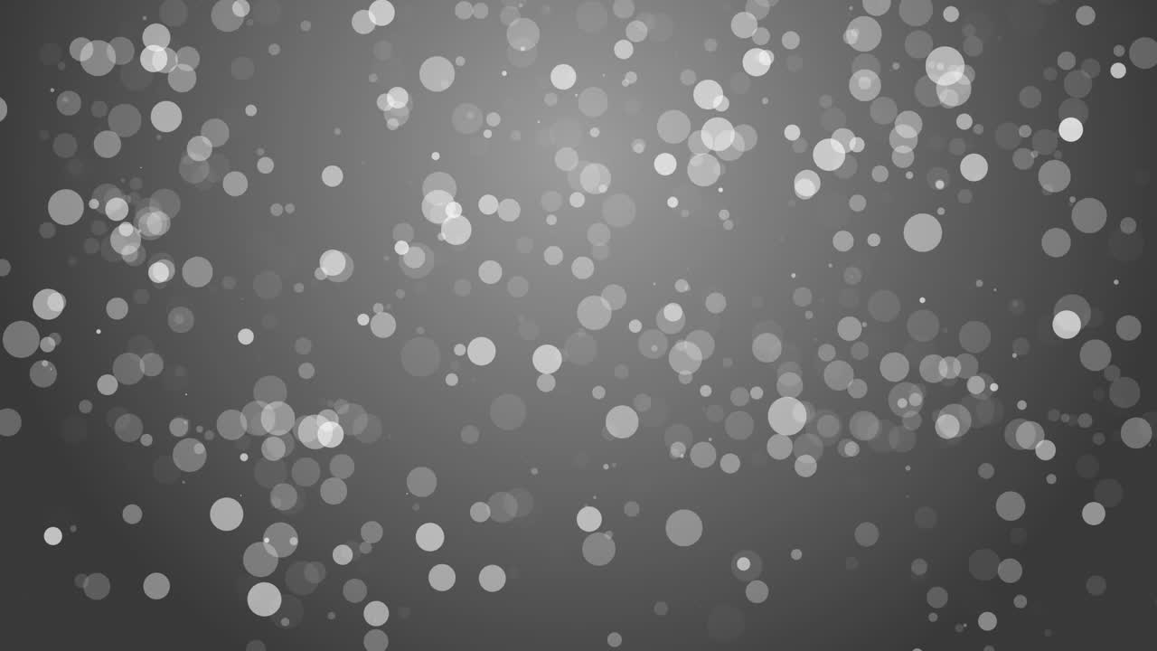 White dots Christmas background. Subtle flying snow flakes on grey background. Bizarre winter silver snowflake. Loop animation.
