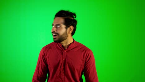 Indian-guy-surprising-motion-with-green-screen---green-background