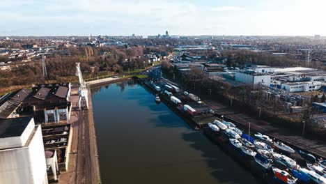 Aerial-hyperlapse-showing-buildings,-cars-and-city-landscape