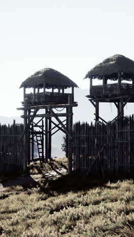 a wooden gate to a medieval castle