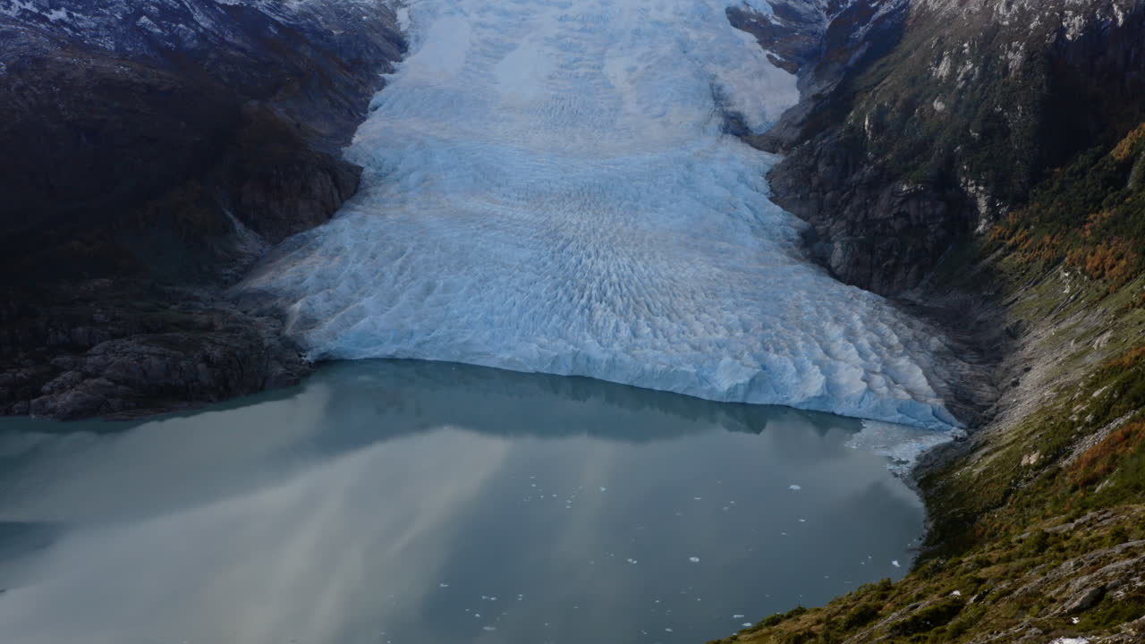 Glacier And Lagoon In The Beagle Channel In South America. - aerial reveal shot
