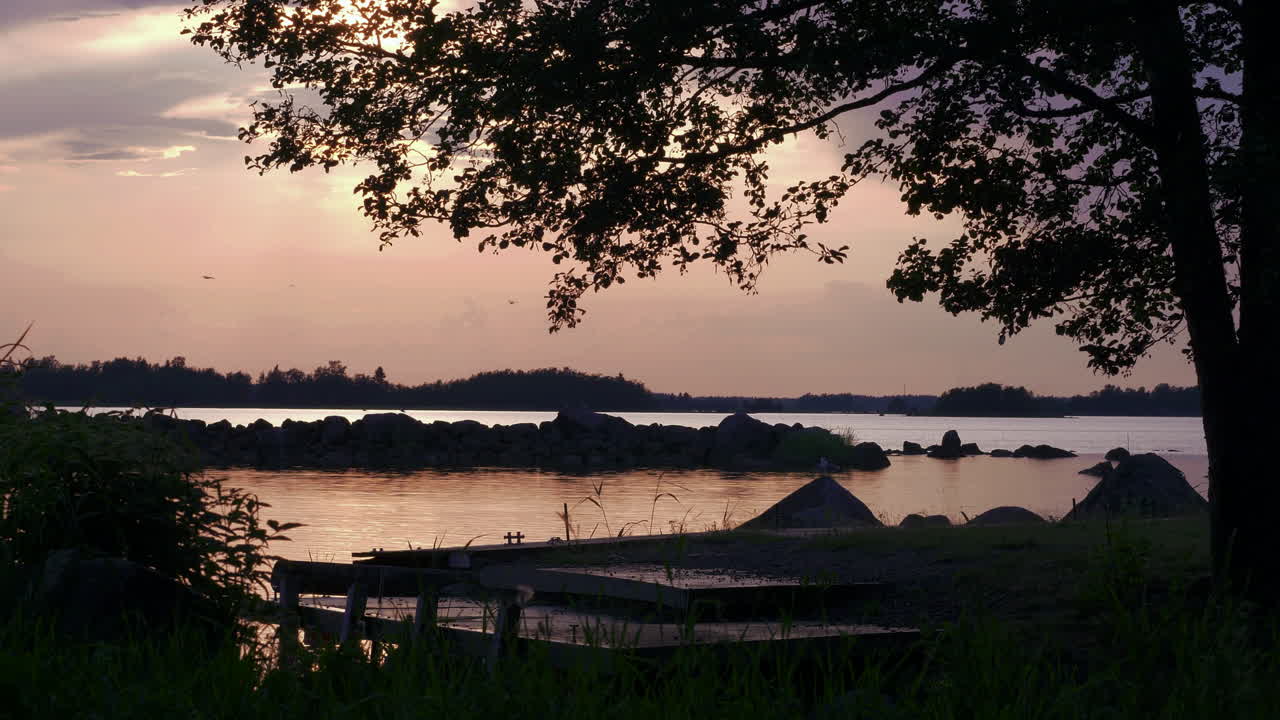 Bright summer night and pink sky in Northern Europe