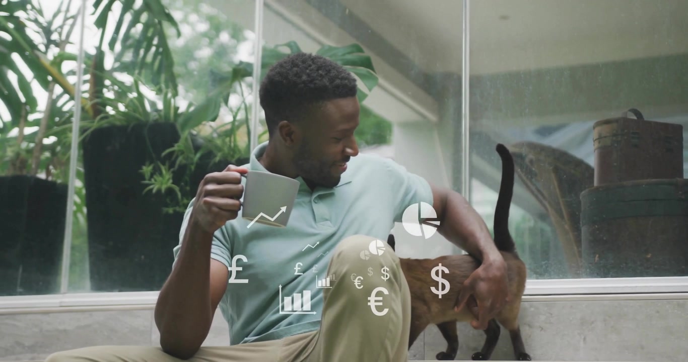 Man in teal glancing at cat entering frame, petting it with finance icons drifting around mug