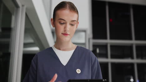 nurse using a tablet