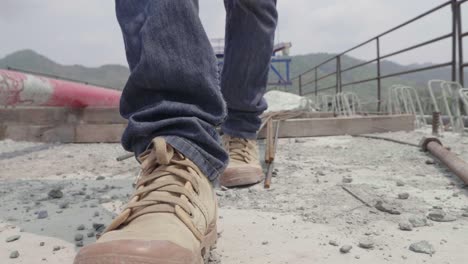 construction worker walking on a bridge construction site