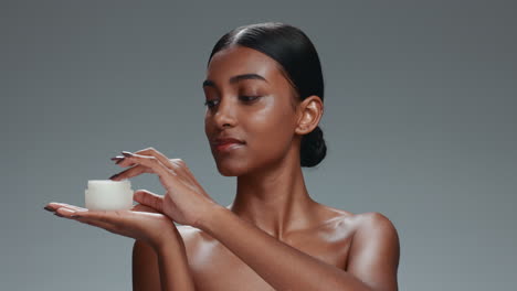 beauty, cream and face portrait of a woman