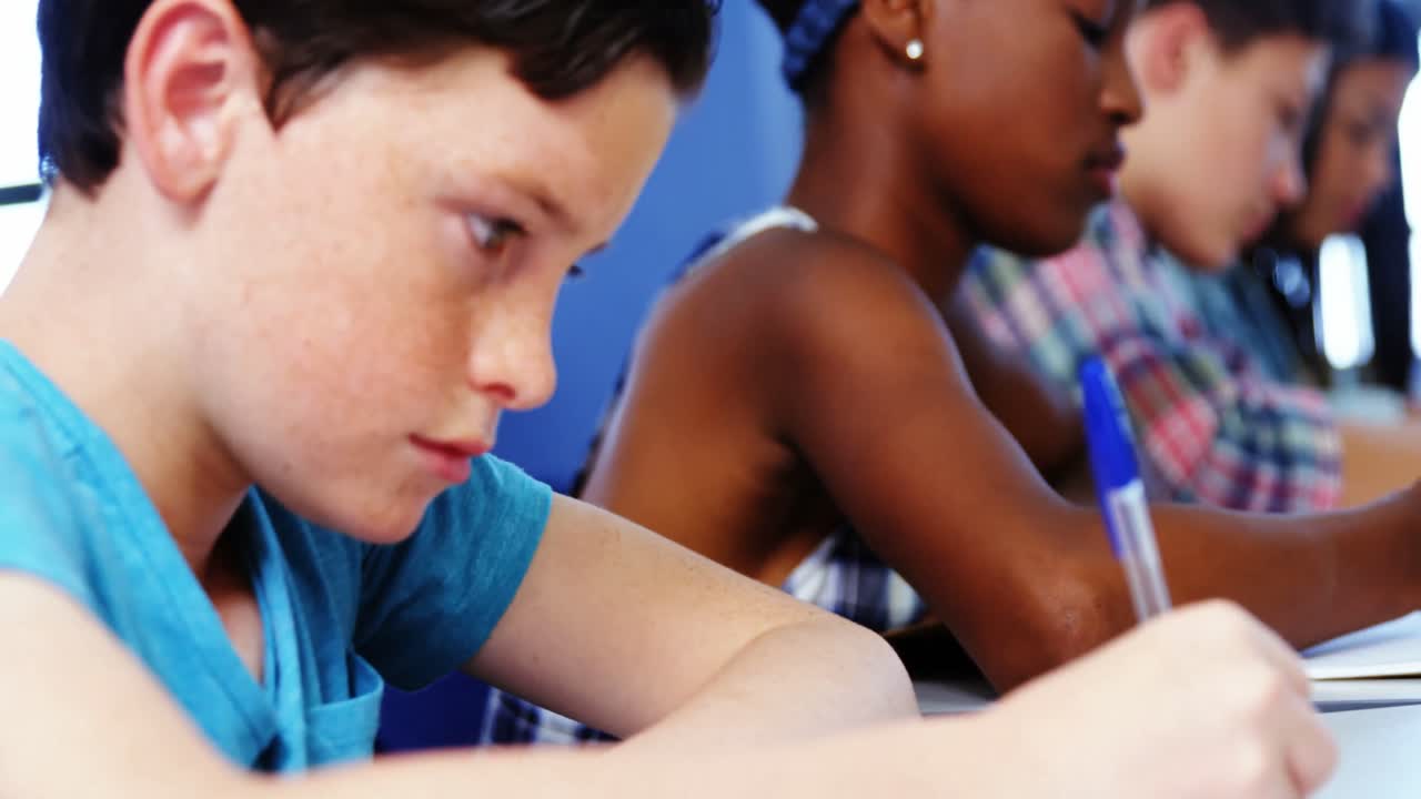 Students studying in classroom