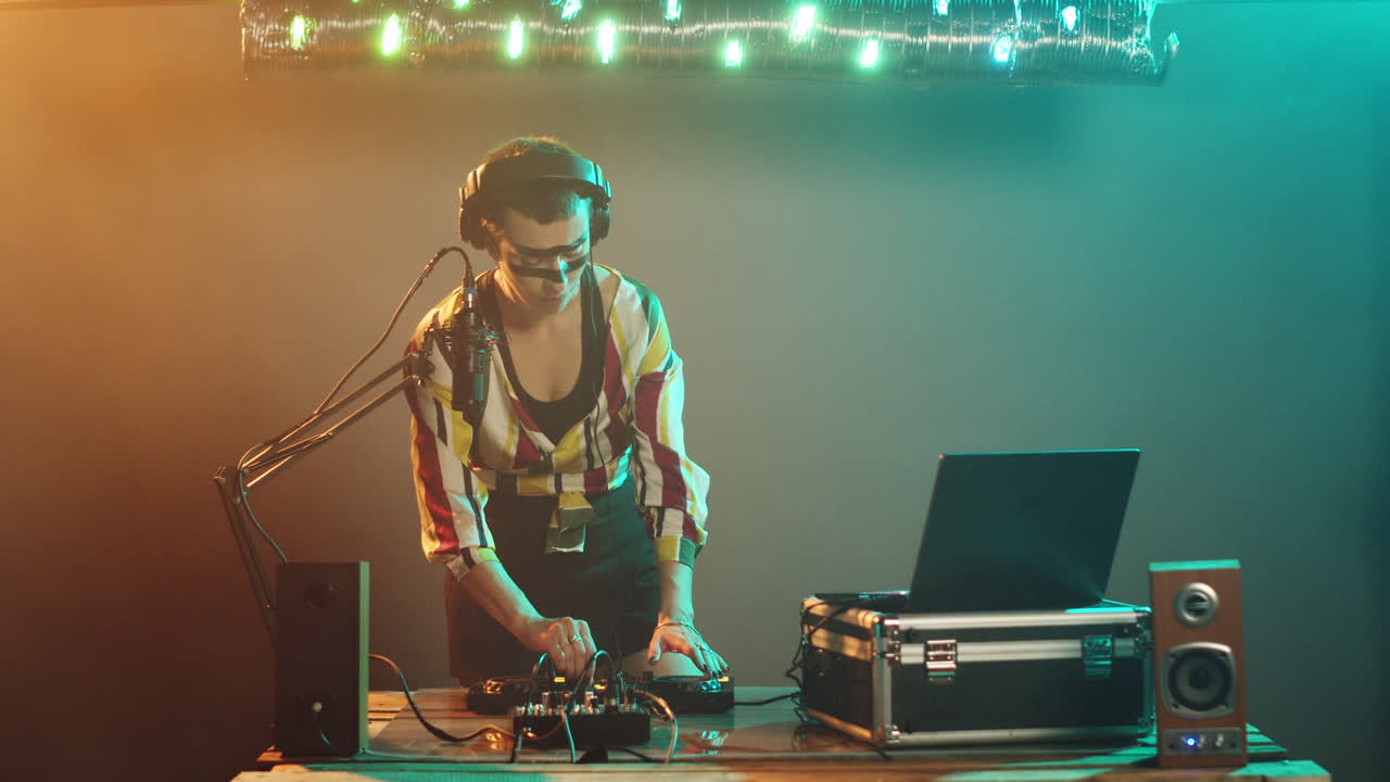 Female artist playing remix melody at turntables