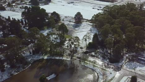 drone footage over the lake in trentham after snow on 11 august 2019