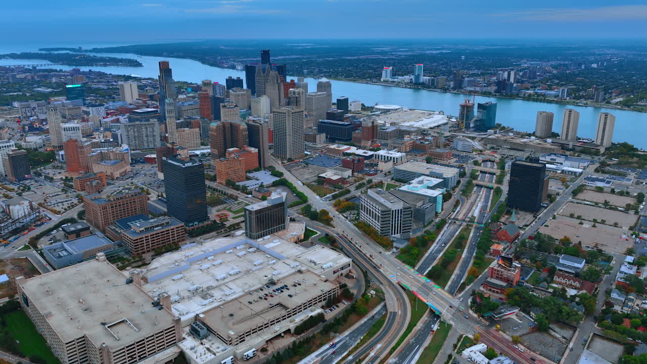 Detroit, USA, 28 July 2025: Detroit Downtown View with Massive Parking Structure and Roads. An elevated view captures the downtown Detroit skyline