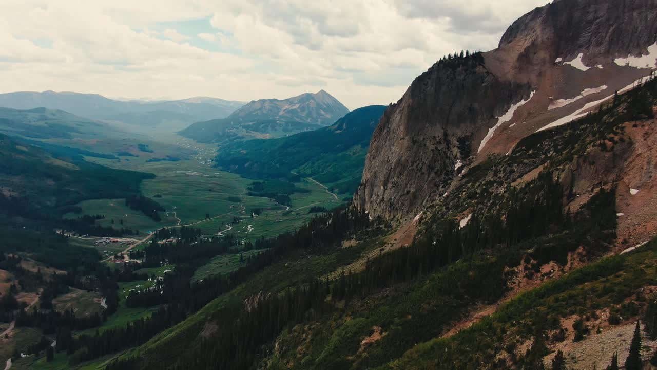 Drone View Of Steep Colorado Mountain with Gorgeous Valley In the Background