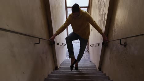 male dancer in an empty warehouse