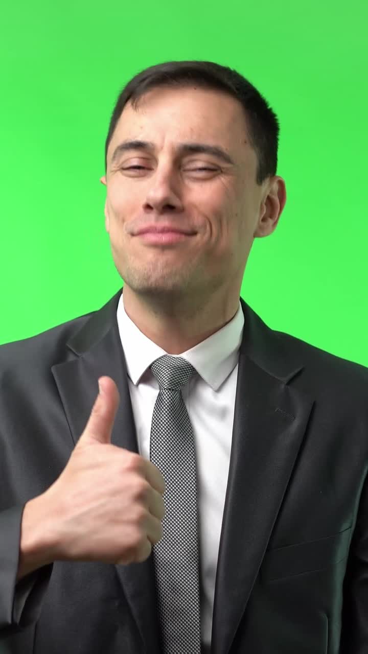 Businessman Relaxing and Smiling on Green Screen