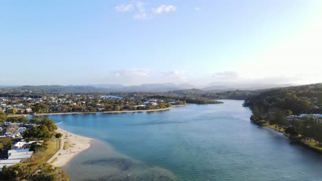 cars travelling on the tallebudgera creek bridge - burleigh heads, gold coast, queensland, australia
