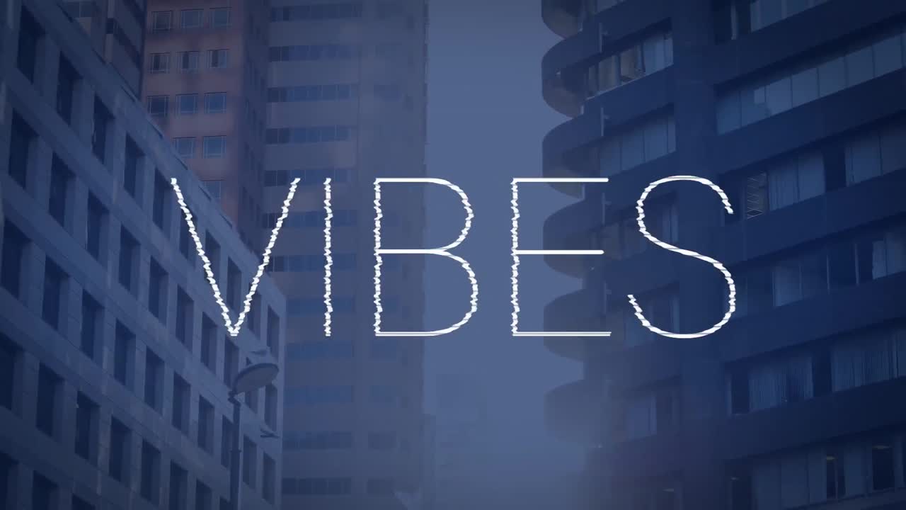 Animation of vibes text in white over modern city buildings