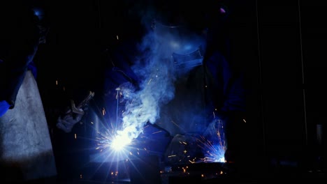 Welder-welding-a-metal