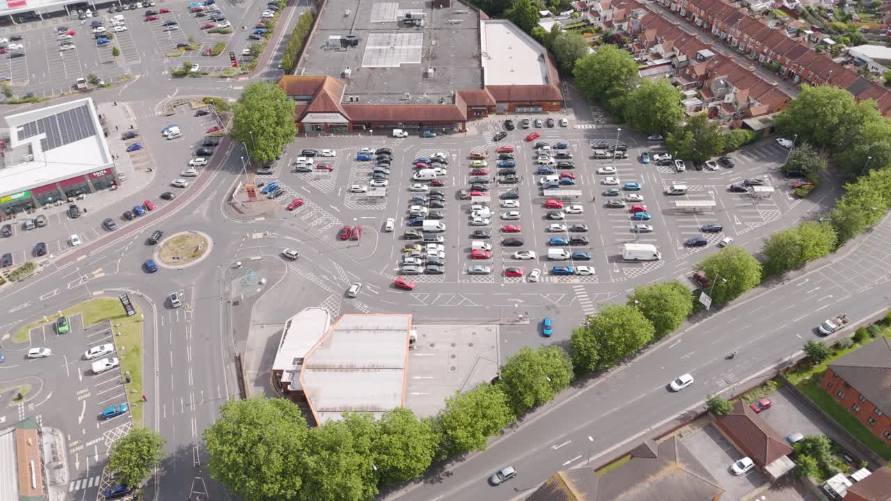 Aerial View of a Sainsbury's Supermarket and Busy Parking Lot
