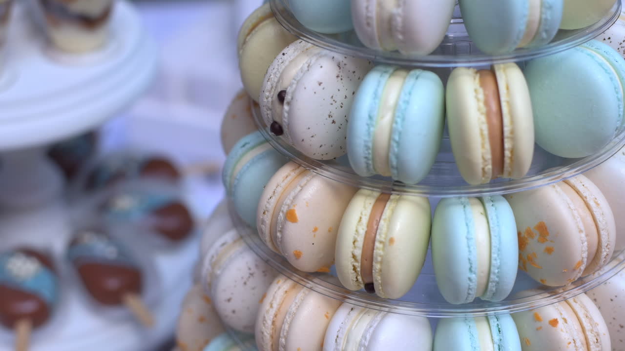Cinematic close-up shot of dessert table on an event. Candy bar idea