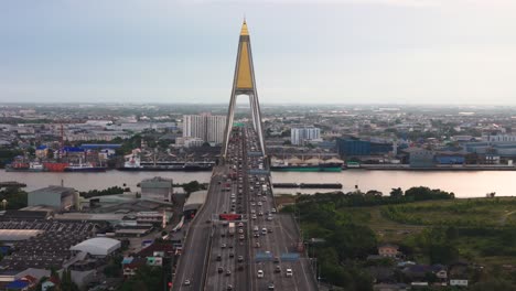 fly towards kanchanaphisek bridge at chao phraya river in bangkok, thailand