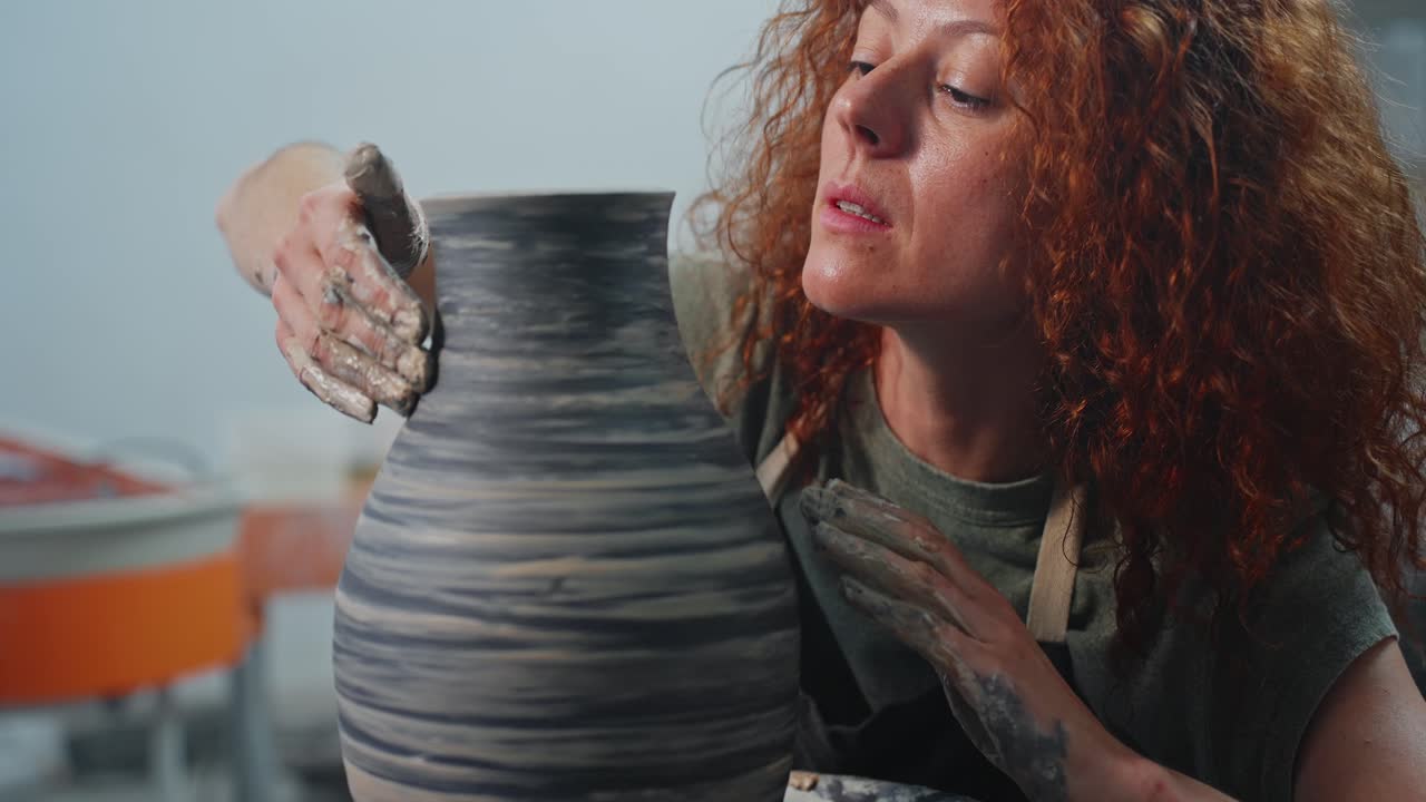 Woman Craftsperson Creating a Vase