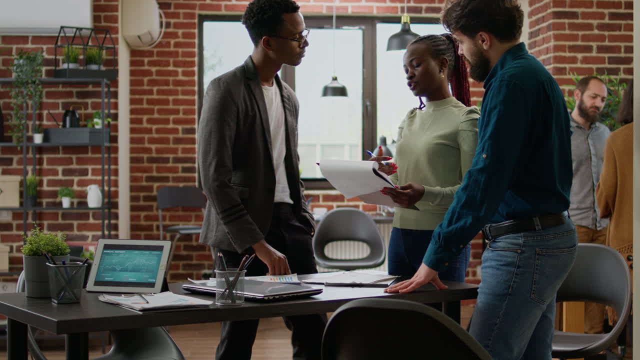 Coworkers doing business collaboration to work on data report