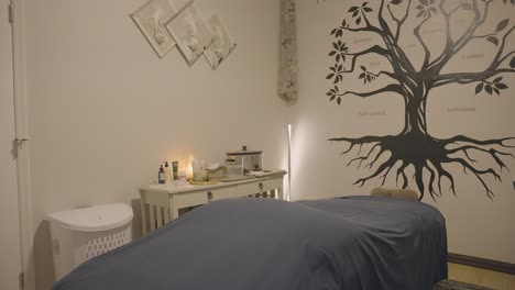 the serene atmosphere of the massage room adorned with a stunning graffiti mural is clearly visible.