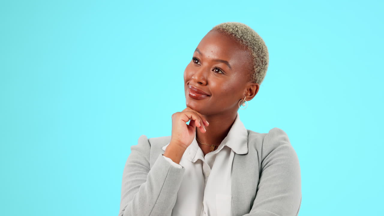 Thinking, happy and black woman in studio