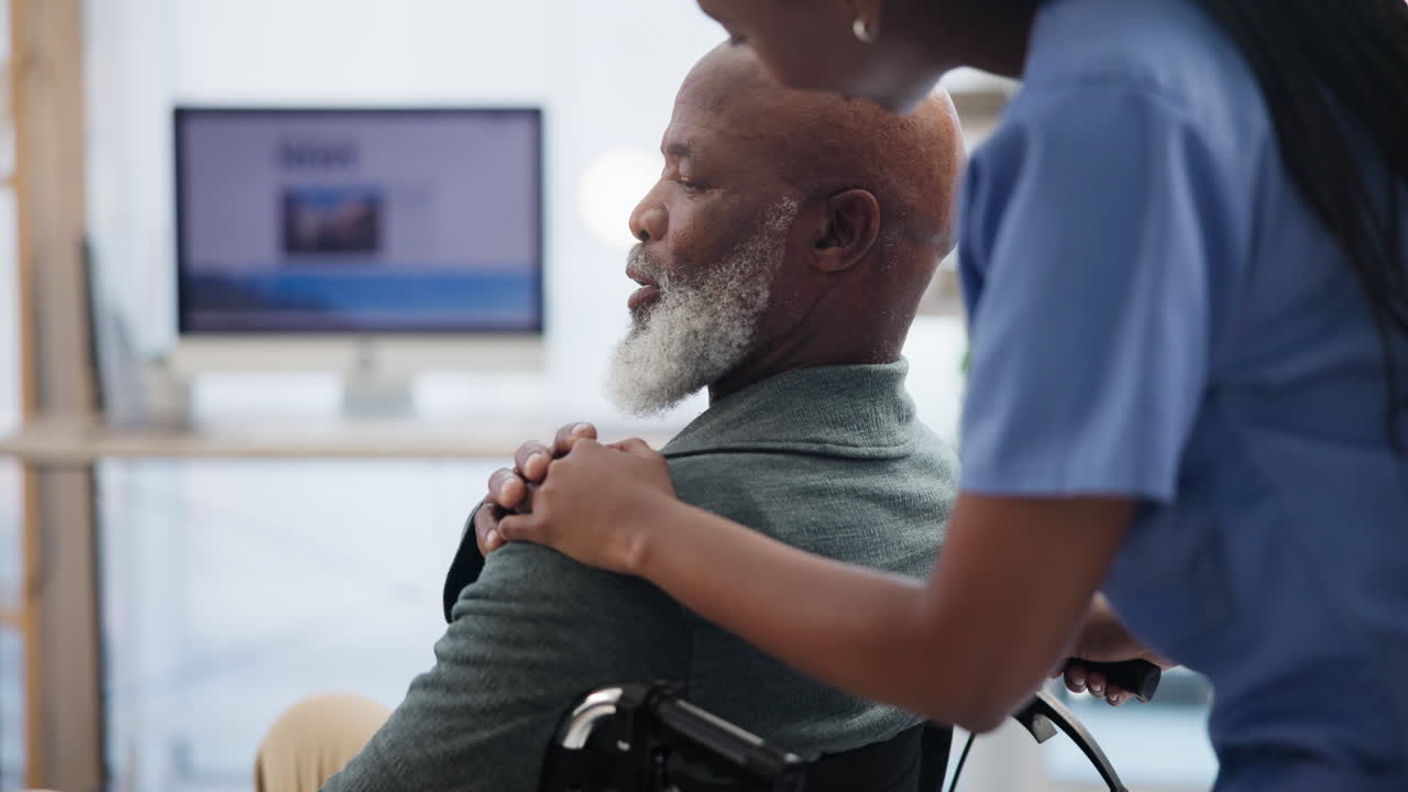 Nurse supporting a senior patient in a wheelchair