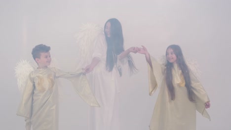 Family dressed as angels