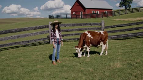 woman and cow on a farm