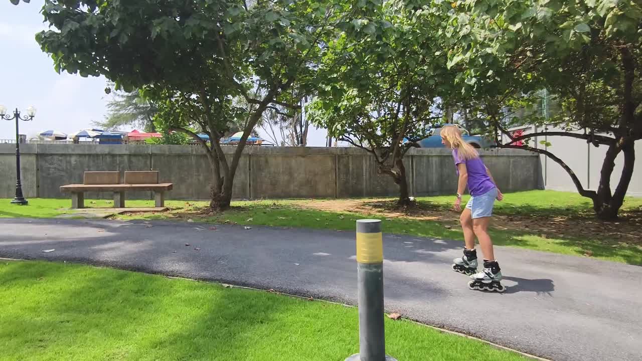 Woman Rollerblading in Park