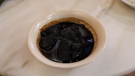 popoh rose's chu kut (pork ribs) - a flavorful dish in george town, penang, malaysia - close up