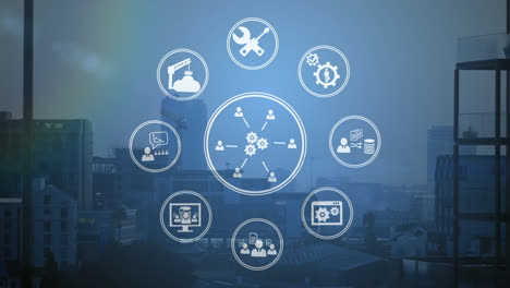 Animation of digital icons spinning against aerial view of cityscape
