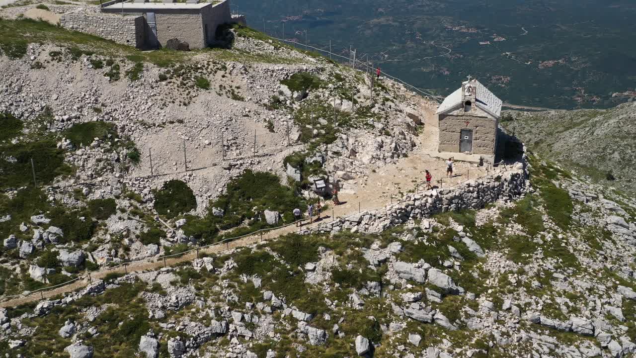 Tourists walking on Biokovo Peak Saint Jure - Aerial Drone View